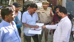 TelTelangana Police personnel conduct investigations following the tragic bus accident in Saudi Arabia