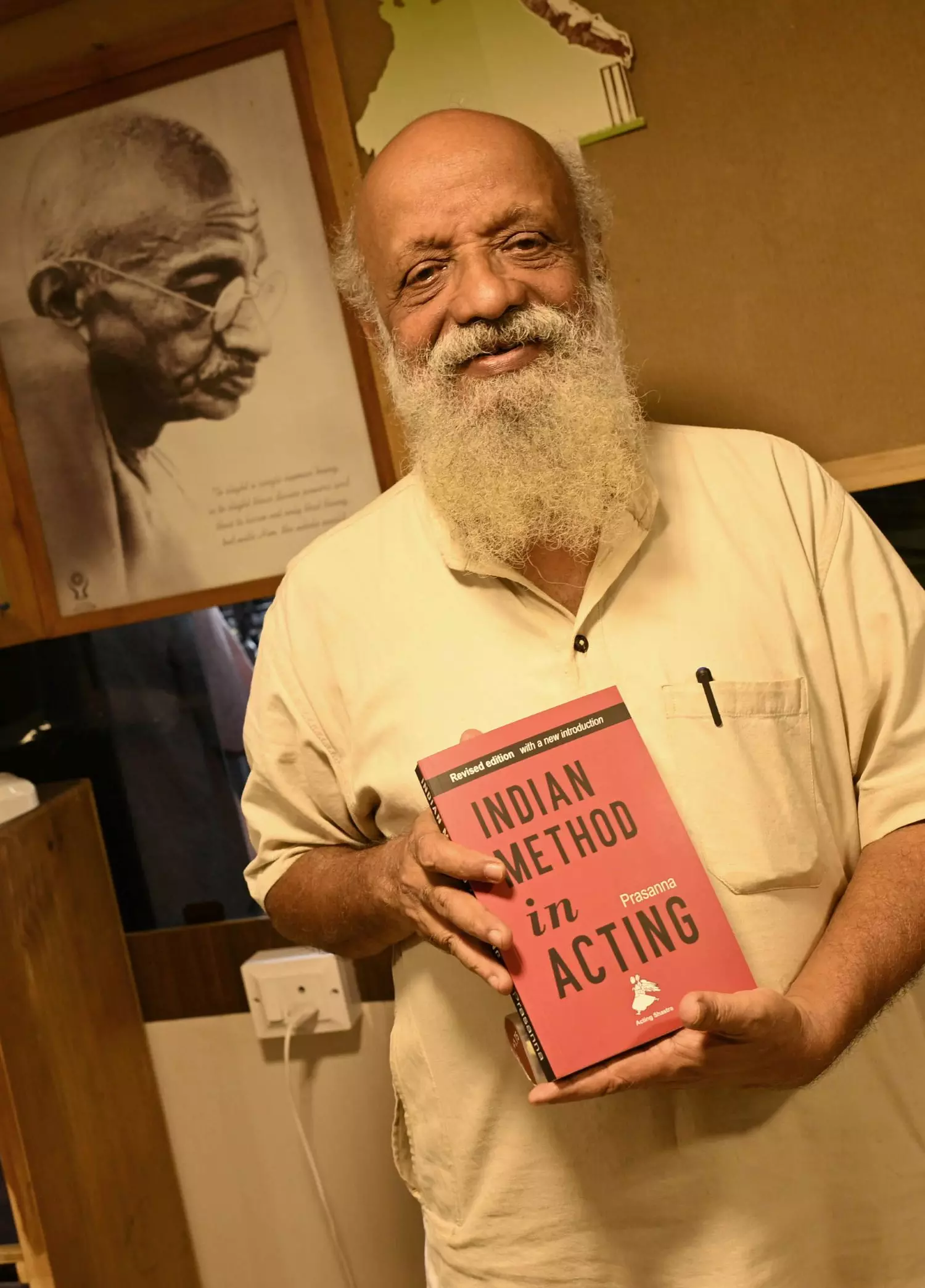 Prasanna hold a book authored by him. Photo: K Bhagya Prakash Prasanna hold a book authored by him. Photo: K Bhagya Prakash