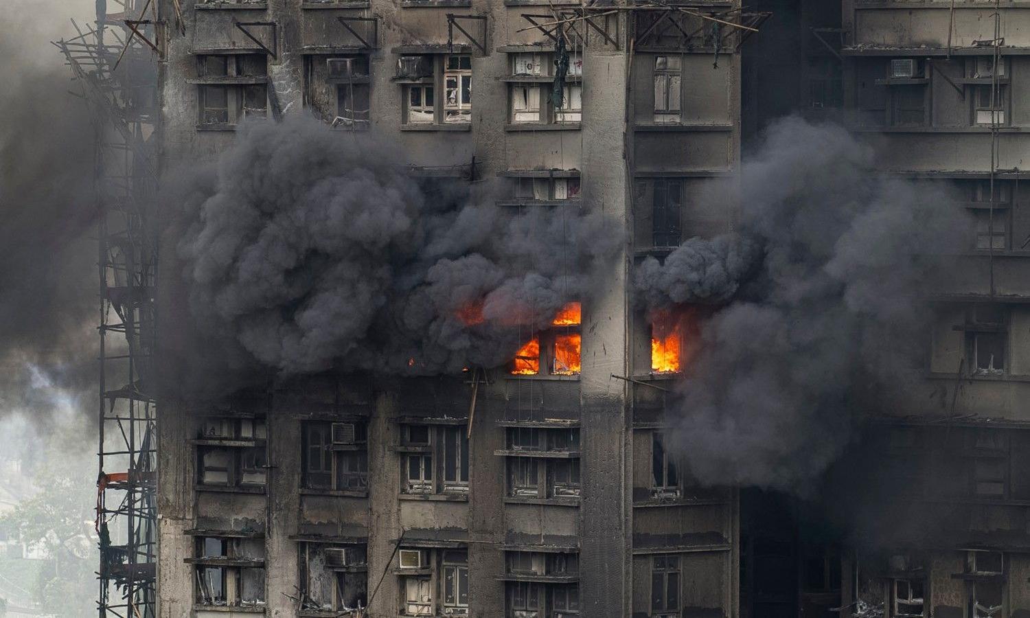 Hong Kong fire death toll soars to 128, hundreds missing; police cite gross negligence