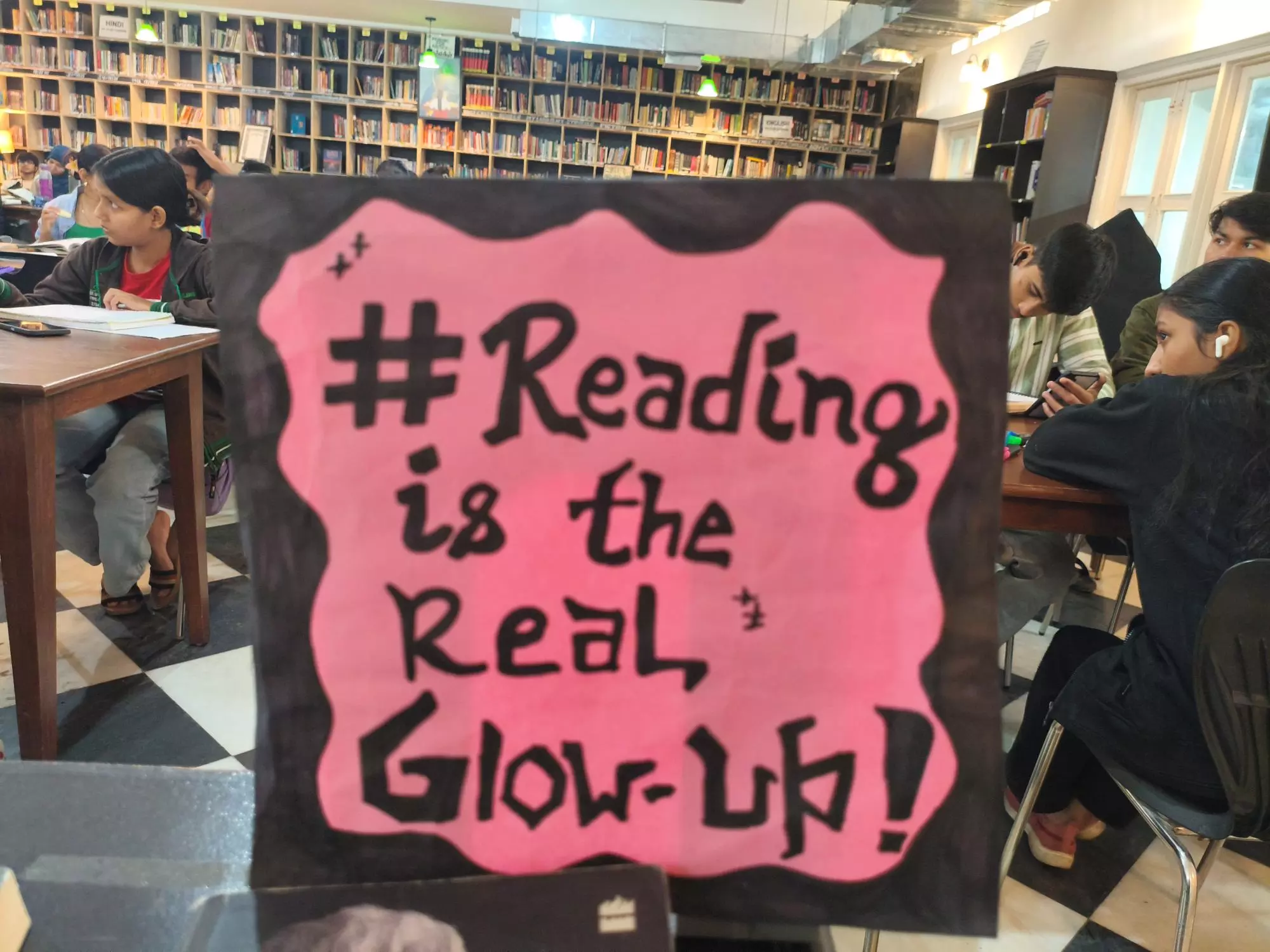 A placard extolling the virtues of reading at TCLPs Kotla Mubarakpur library. Photo: Aranya Shankar A placard extolling the virtues of reading at TCLPs Kotla Mubarakpur library. Photo: Aranya Shankar