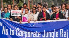 Opposition MPs protest on Day 3 of the Winter Session of Parliament on December 3, 2025.