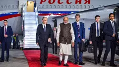 Prime Minister Narendra Modi receives Russian President Vladimir Putin at New Delhi airport late Thursday night