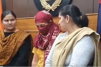 A woman, accused of killing four minor children, including three girls, with police officers in Haryana