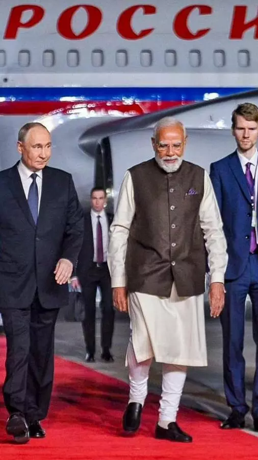Prime Minister Narendra Modi receives Russian President Vladimir Putin at New Delhi airport late Thursday night Prime Minister Narendra Modi receives Russian President Vladimir Putin at New Delhi airport late Thursday night