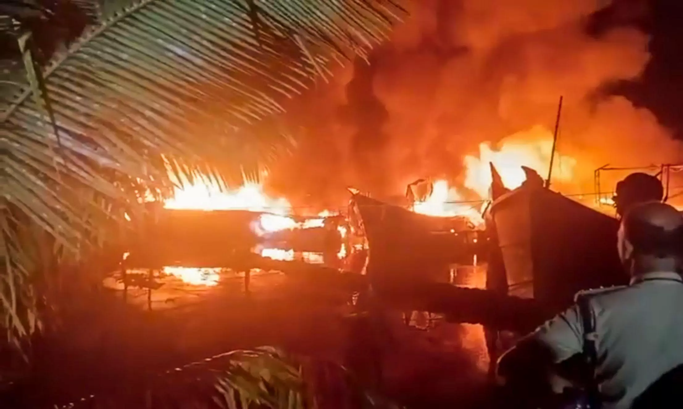 Ashtamudi Lake boats fire Ashtamudi Lake boats fire