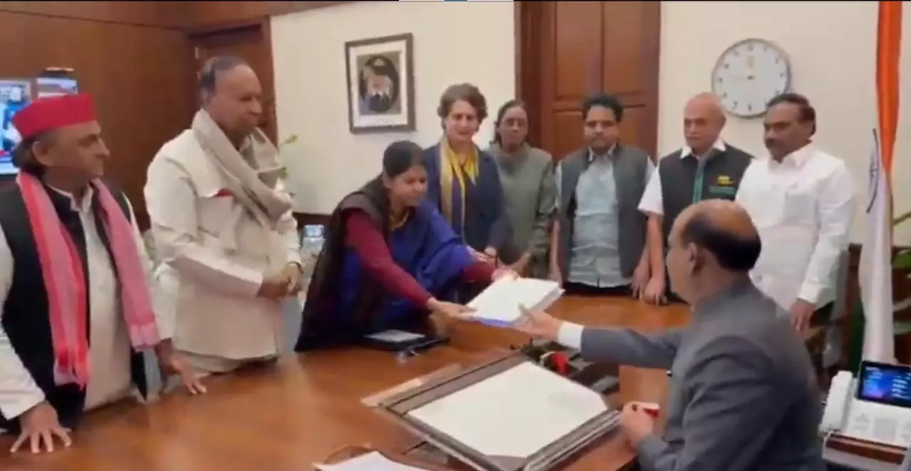 INDIA bloc MPs handing notice to Lok Sabha Speaker INDIA bloc MPs handing notice to Lok Sabha Speaker