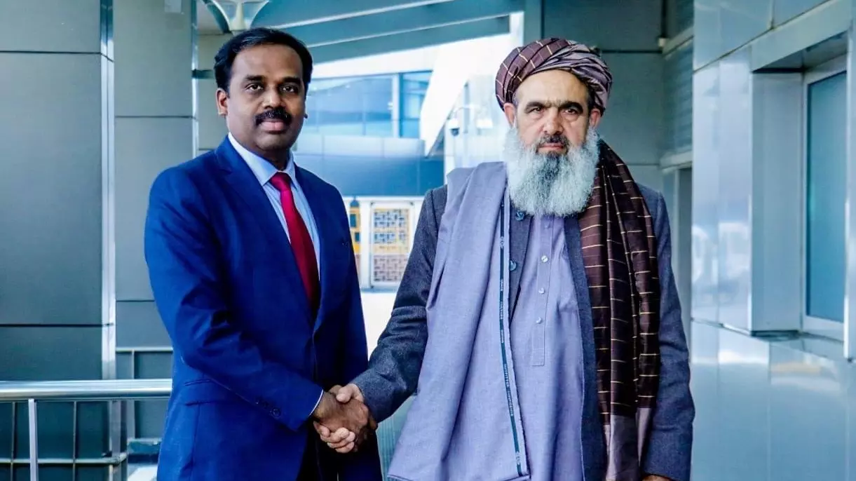 Taliban Health Minister Noor Jalal Jalali (right)