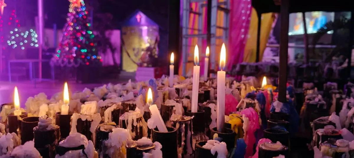 The glow of the many candles lit at Our Lady of Health Shrine of Vilankanni, New Delhi, is brighter than that of the lit-up Christmas Tree. The origin story of the Shrine, the first of which was built in Tamil Nadu’s Vilankanni dates back to the sixteenth century, when it is said ‘Our Lady’ with her infant son appeared to first to a Hindu boy carrying milk to a disabled boy selling buttermilk, whom she cured. The Delhi Shrine was reportedly established sometime in the 1950s. Photo: Lokesh  