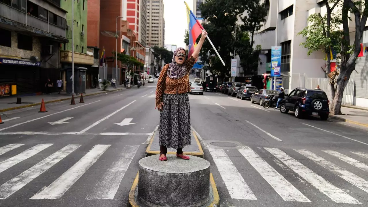 A supporter of Venezuelan President Nicolas Maduro A supporter of Venezuelan President Nicolas Maduro