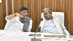 Karnataka CM Siddaramaiah (right) and his deputy DK Shivakumar