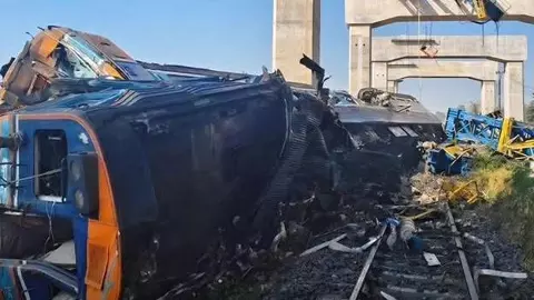 Construction crane falls on passenger train in northeastern Thailand, killing at least 22 people