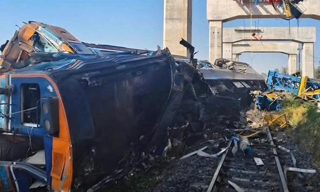 Construction crane falls on passenger train in northeastern Thailand; 22 dead