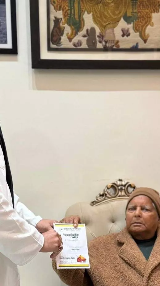 Tej Pratap with Lalu Prasad