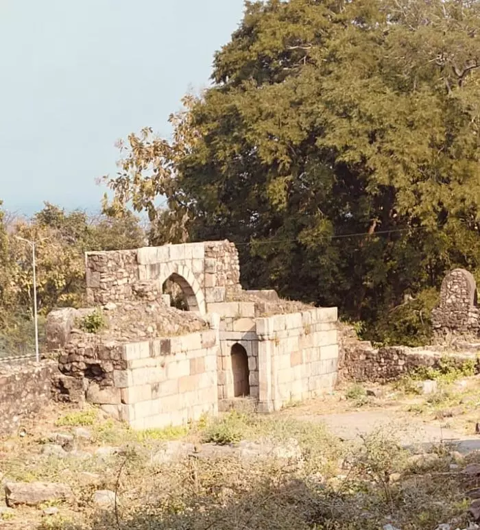 My son declared the historical ‘Atak Gate’ his favourite part of Champaner. Then he noticed the scribbles on the walls — names scratched into stone. “Why do people write on something so beautiful?” he asked. Photo: Namrata Yadav