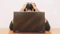 Stressed and Anxious Young men Looking at Laptop Screen