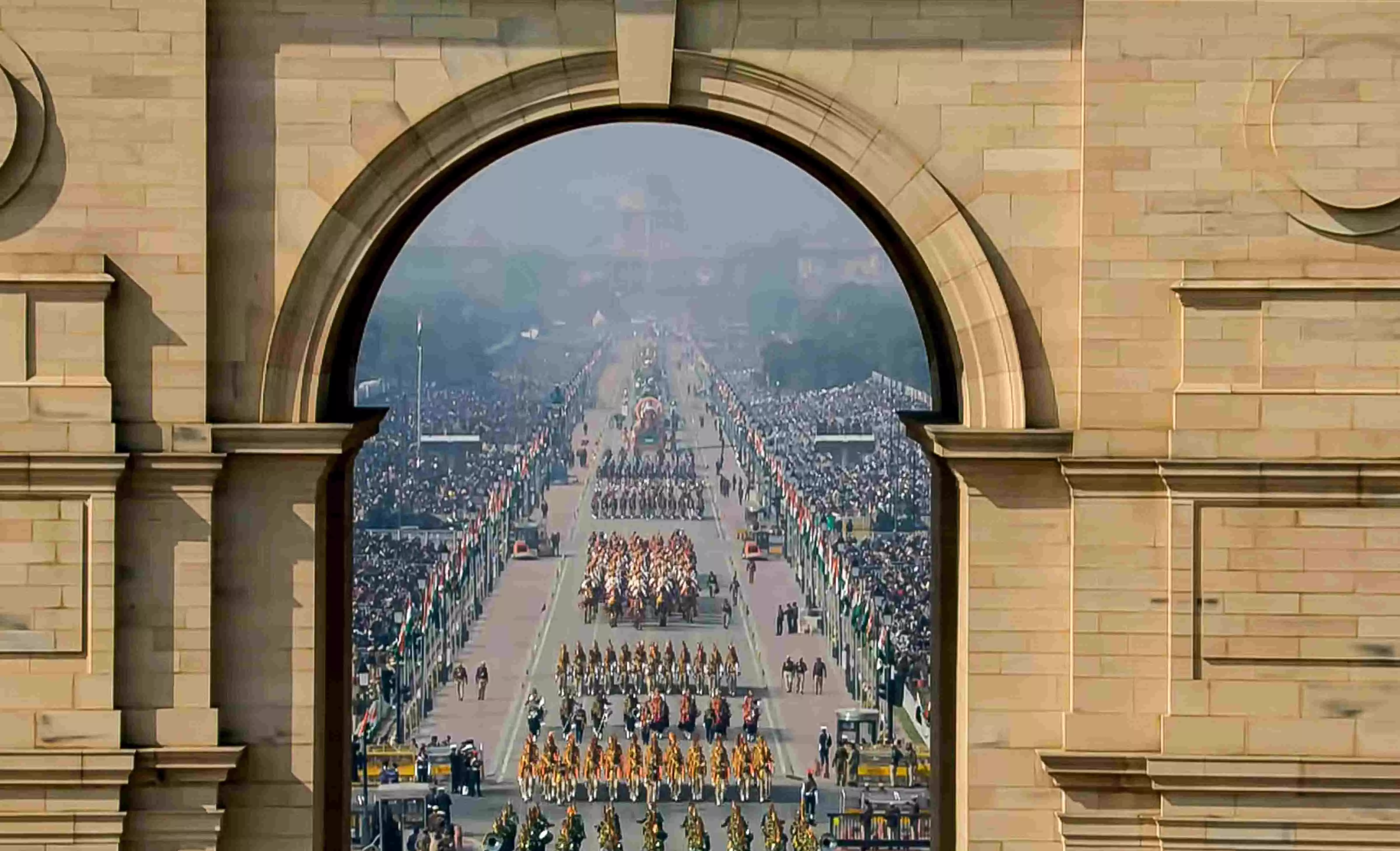 A view of the marching contingents during the 77th Republic Day Parade, as seen through the India Gate, at Kartavya Path, in New Delhi. Photo: PTI A view of the marching contingents during the 77th Republic Day Parade, as seen through the India Gate, at Kartavya Path, in New Delhi. Photo: PTI