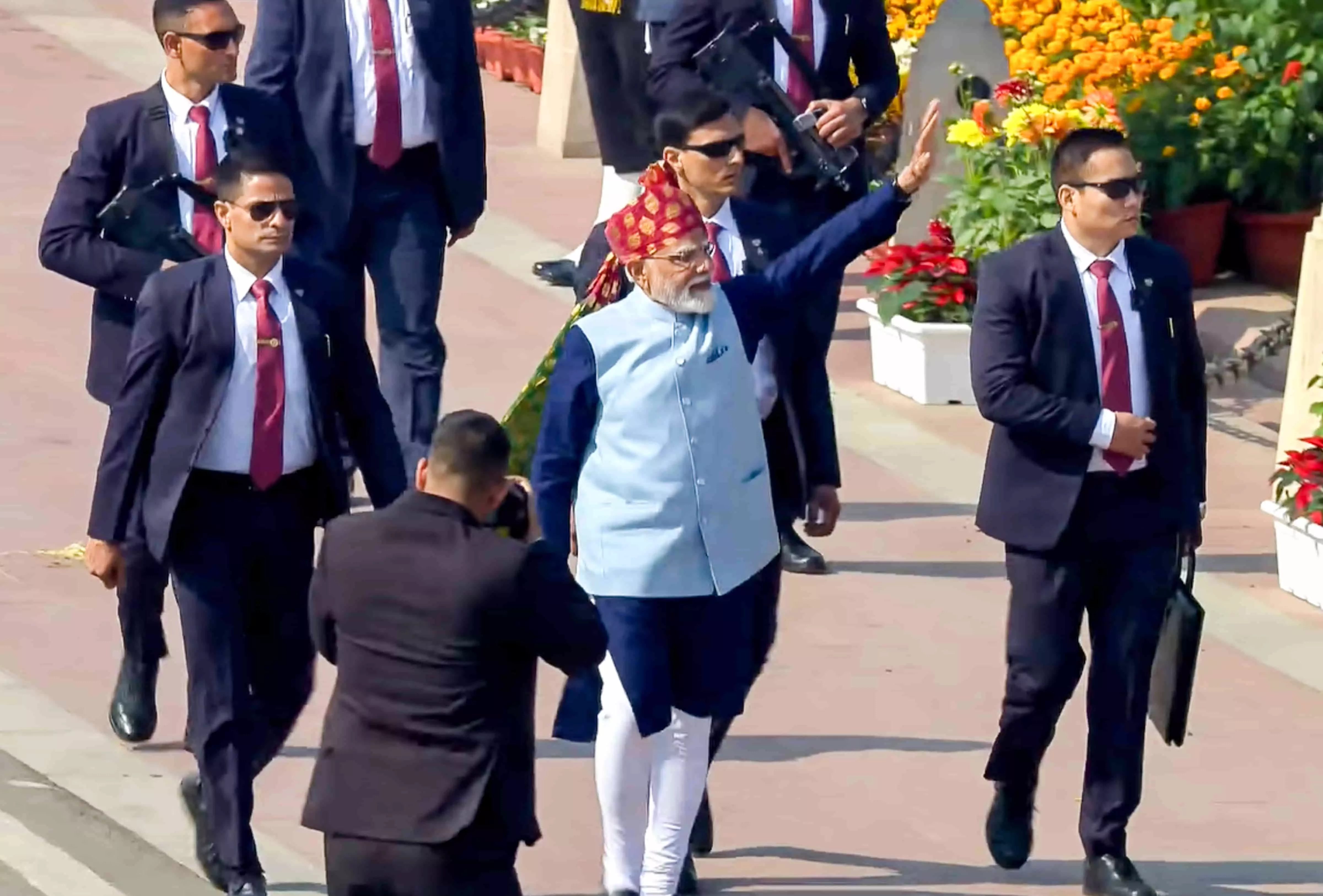 Prime Minister Narendra Modi greets the gathering after the 77th Republic Day Parade, at Kartavya Path, in New Delhi. Photo: PTI Prime Minister Narendra Modi greets the gathering after the 77th Republic Day Parade, at Kartavya Path, in New Delhi. Photo: PTI