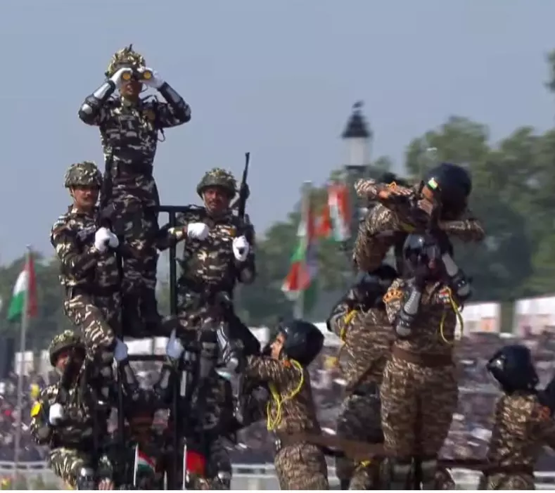 Assistant Commandant Rishu Shrikant Palande of the CRPF leads a coordinated drill with 11 personnel, recreating a counter-insurgency operation and showcasing sharp target engagement skills during the Republic Day Parade at Kartavya Path. Screengrab: ANI Assistant Commandant Rishu Shrikant Palande of the CRPF leads a coordinated drill with 11 personnel, recreating a counter-insurgency operation and showcasing sharp target engagement skills during the Republic Day Parade at Kartavya Path. Screengrab: ANI