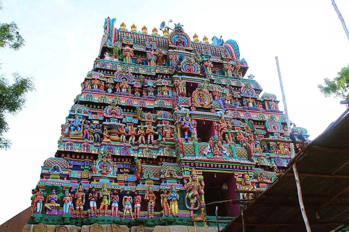 The Thirunageswaram Raagu temple, dedicated to Rahu, is one of the most powerful Navagraha sites. The gopuram rose like a riot of myth, layered with hundreds of painted gods, demons, and celestial guardians. Photo: Veidehi Gite The Thirunageswaram Raagu temple, dedicated to Rahu, is one of the most powerful Navagraha sites. The gopuram rose like a riot of myth, layered with hundreds of painted gods, demons, and celestial guardians. Photo: Veidehi Gite