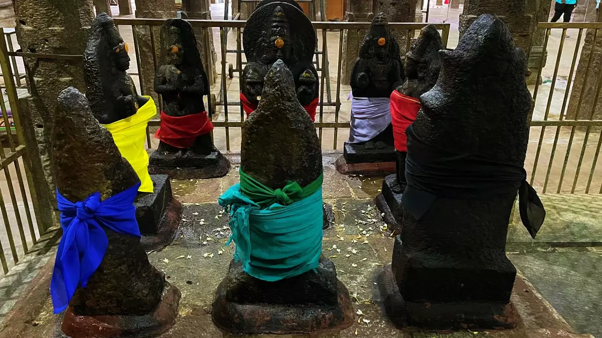 Navagraha shrine at Vaitheeswaran Koil. Here the nine planets are worshipped in raw stone forms wrapped in coloured cloth. Photo: Veidehi Gite Navagraha shrine at Vaitheeswaran Koil. Here the nine planets are worshipped in raw stone forms wrapped in coloured cloth. Photo: Veidehi Gite
