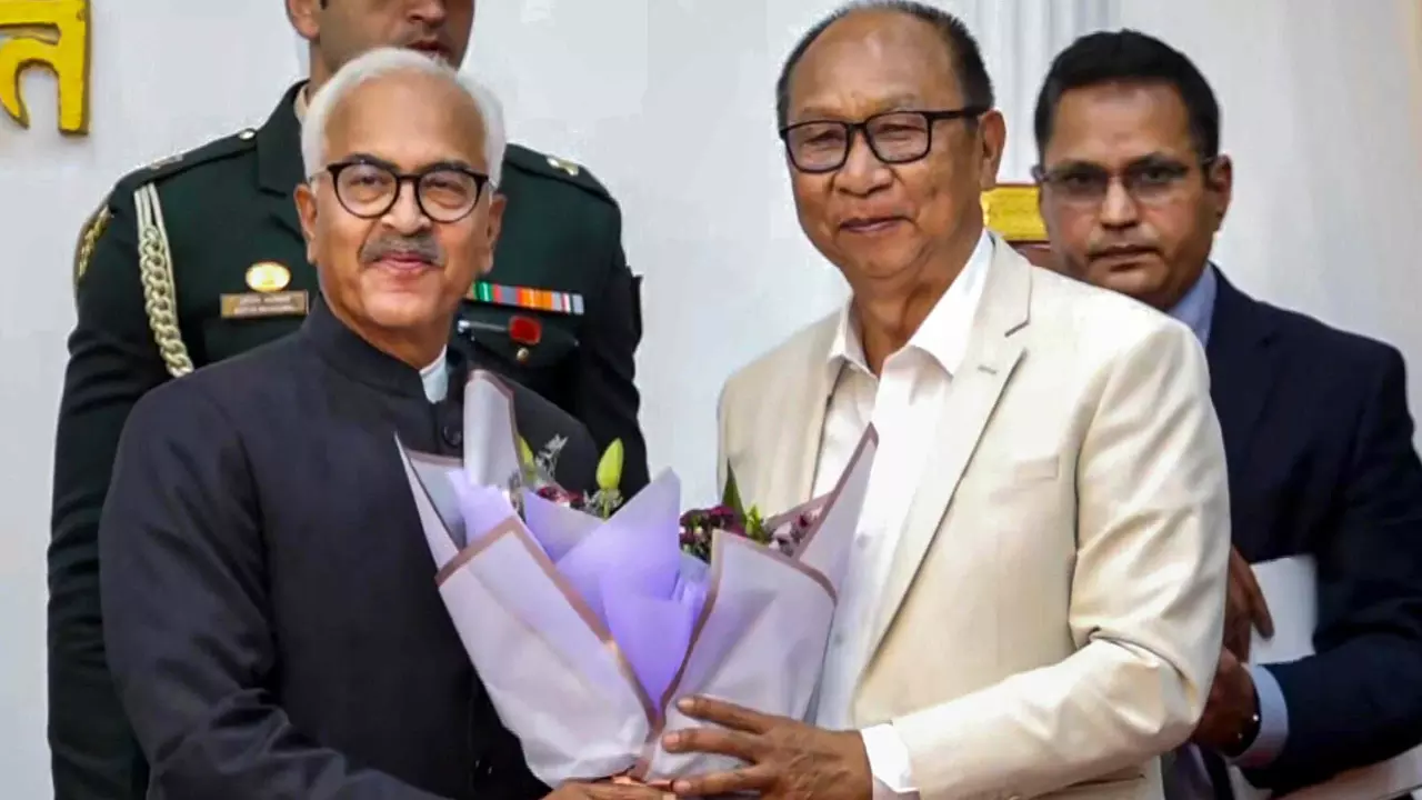 Manipur Governor Ajay Kumar Bhalla (left) and Yumnam Khemchand Singh