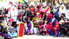 Fans in colorful cosplay costumes gather at Comic Con 2026 in Chennai, posing and interacting at the pop culture festival.