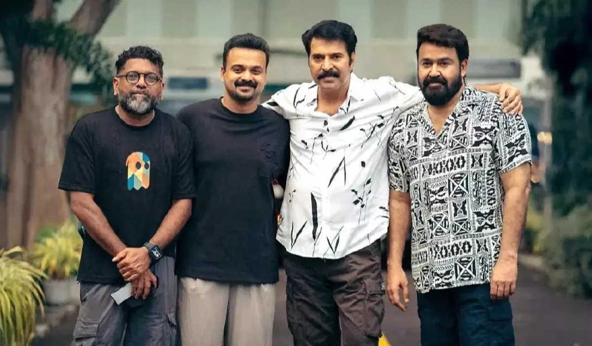 Mahesh Narayanan with producer Kunchacko Boban, Mammootty and Mohanlal. Photo: IMDB