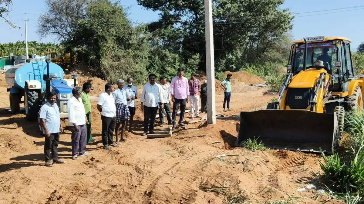 The makeshift road conencting Prasanna Kumars farm to the village road being built. Photo: By special arrangement