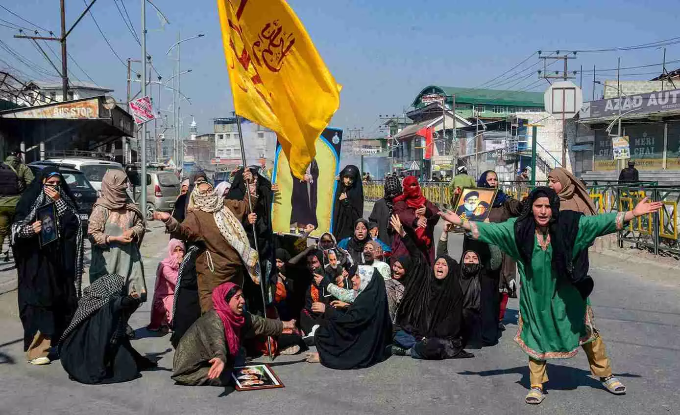 Women raise slogans as they stage a protest over the killing of Irans Supreme Leader Ayatollah Ali Khamenei in Srinagar on Monday. PTI Photo Women raise slogans as they stage a protest over the killing of Irans Supreme Leader Ayatollah Ali Khamenei in Srinagar on Monday. PTI Photo