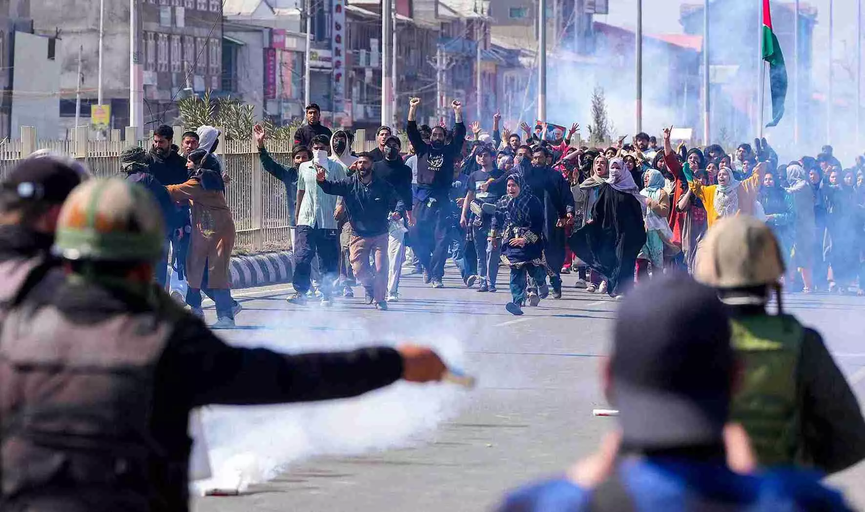 People from the Muslim community raise slogans amid tear gas fired by the police at a protest over the killing of Irans Supreme Leader Ayatollah Ali Khamenei despite severe restrictions being imposed on the movement of people in parts of Kashmir, Srinagar, on March 2. PTI Photo People from the Muslim community raise slogans amid tear gas fired by the police at a protest over the killing of Irans Supreme Leader Ayatollah Ali Khamenei despite severe restrictions being imposed on the movement of people in parts of Kashmir, Srinagar, on March 2. PTI Photo