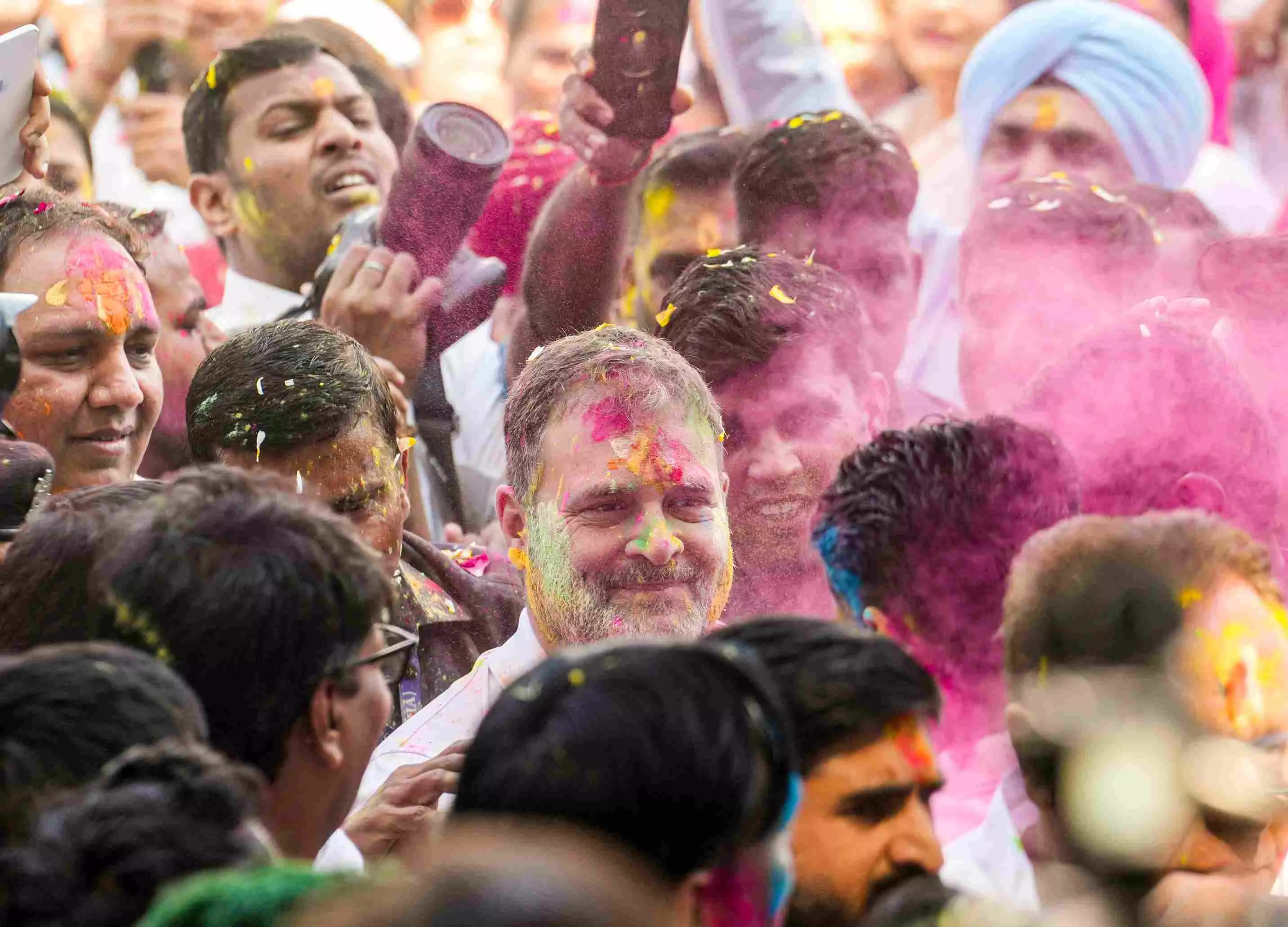 Congress leader Rahul Gandhi celebrates Holi festival with others at the party office in New Delhi. Photo: PTI Congress leader Rahul Gandhi celebrates Holi festival with others at the party office in New Delhi. Photo: PTI