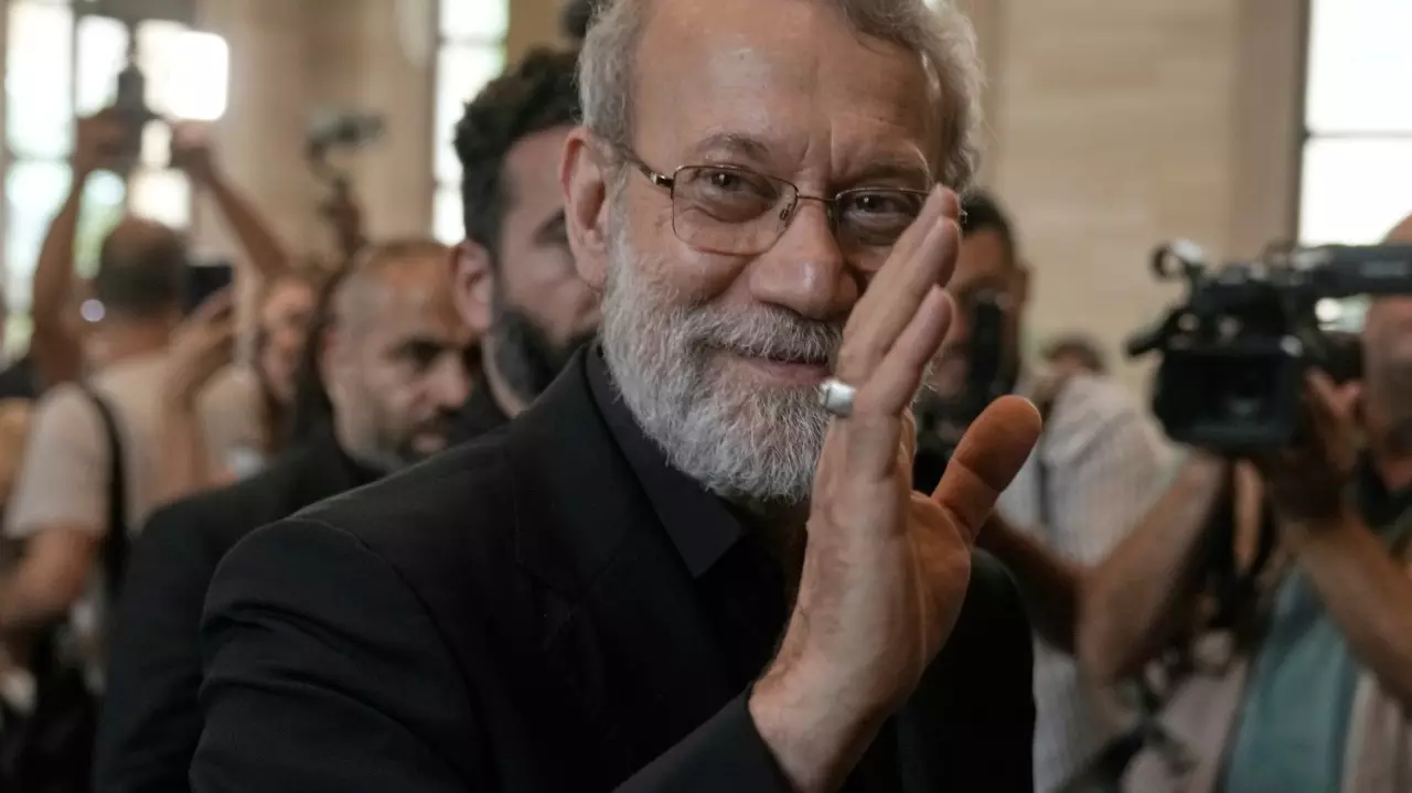 Ali Larijani, the slain secretary of Irans Supreme National Security Council, waves at journalists in Beirut, Lebanon, in August 2025. Photo: AP/PTI