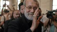 Ali Larijani, the slain secretary of Irans Supreme National Security Council, waves at journalists in Beirut, Lebanon, in August 2025. Photo: AP/PTI