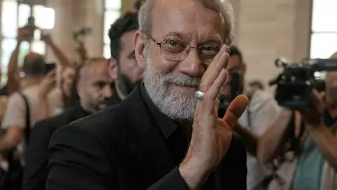 Ali Larijani, the slain secretary of Irans Supreme National Security Council, waves at journalists in Beirut, Lebanon, in August 2025. Photo: AP/PTI