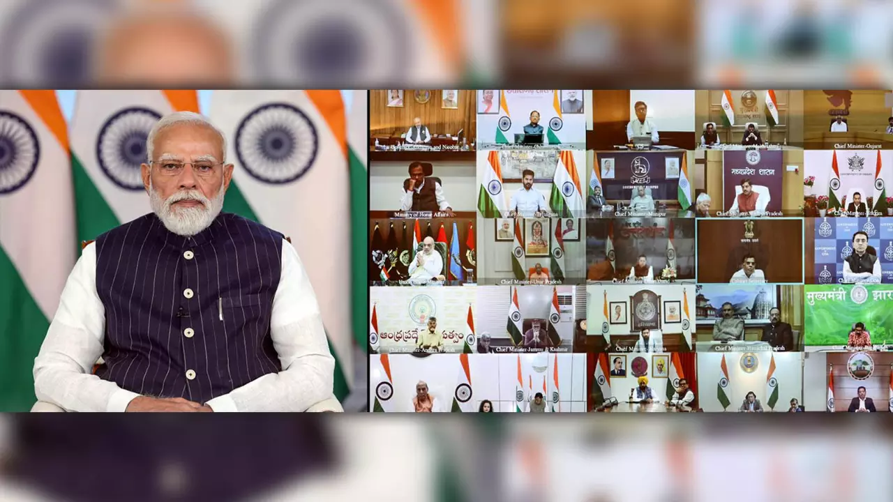 Prime Minister Narendra Modi speaks with CMs