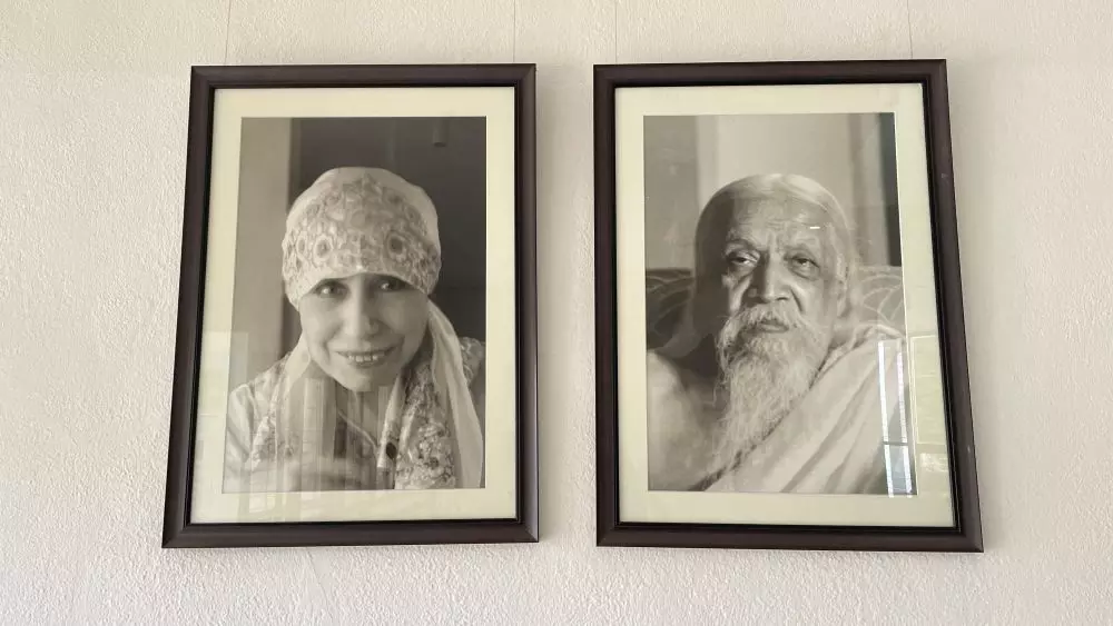 Photos of Sri Aurobindo and The Mother hang together. Photo of images: Veidehi Gite
