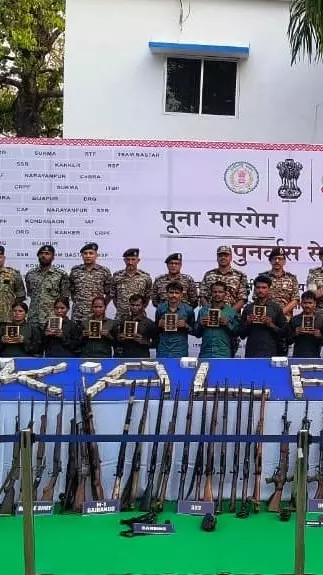 Maoists surrender with arms