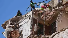 building in Beirut hit by Israeli airstrike building in Beirut hit by Israeli airstrike