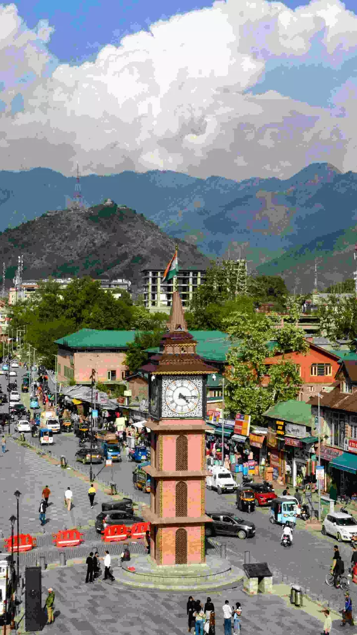 People visit the Ghanta Ghar ahead of the first anniversary of the Pahalgam terror attack, in Srinagar