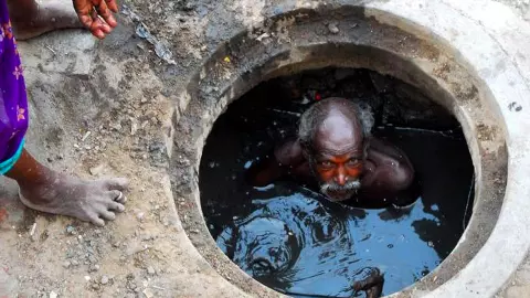 Why, despite laws and court orders, sanitary workers continue to die in toxic fumes-filled manholes