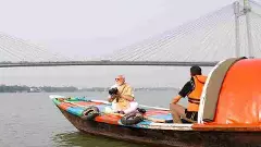 PM takes boat ride on Hooghly river in Kolkata, tries his hand at photography