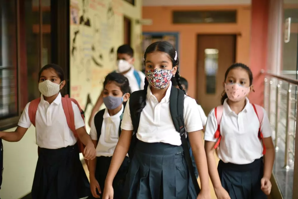By winter, the same children sit indoor, hidden behind face masks, breathing in hazardous air. Photo: iStock