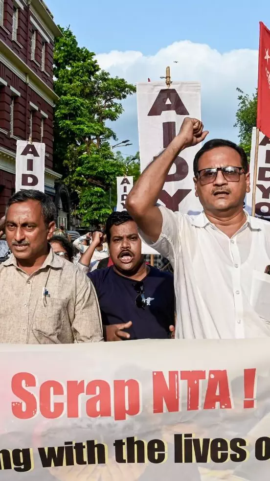 Protest over NEET-UG 2026 exam paper leak. Protest over NEET-UG 2026 exam paper leak.