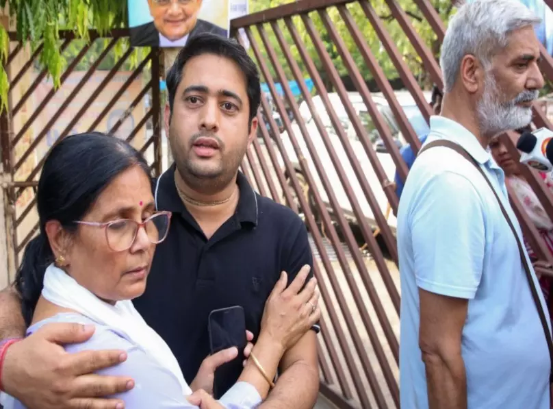Parents and a family member of Twisha Sharma Parents and a family member of Twisha Sharma