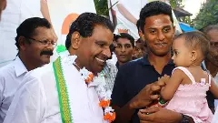 Thiruvanchoor Radhakrishnan (Left)