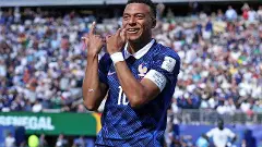 Mbappe surpasses Pele with two goals as France open World Cup with Senegal win Mbappe surpasses Pele with two goals as France open World Cup with Senegal win