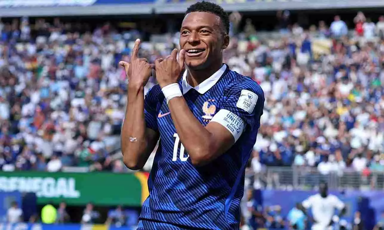 Mbappe surpasses Pele with two goals as France open World Cup with Senegal win Mbappe surpasses Pele with two goals as France open World Cup with Senegal win