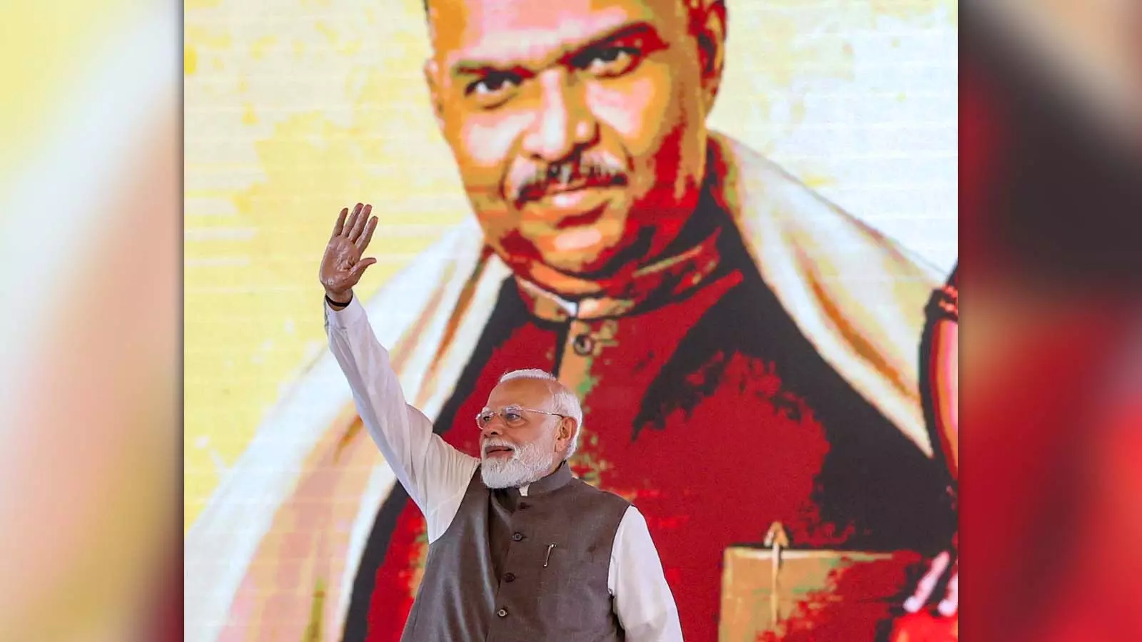 PM Narendra Modi in front of an image of Syama Prasad Mookerjee PM Narendra Modi in front of an image of Syama Prasad Mookerjee