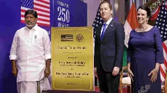 US Ambassador to India Sergio Gor, Telangana Deputy Chief Minister Mallu Bhatti Vikramarka and US Consul General Laura Williams pose beside a plaque commemorating the renaming of the road