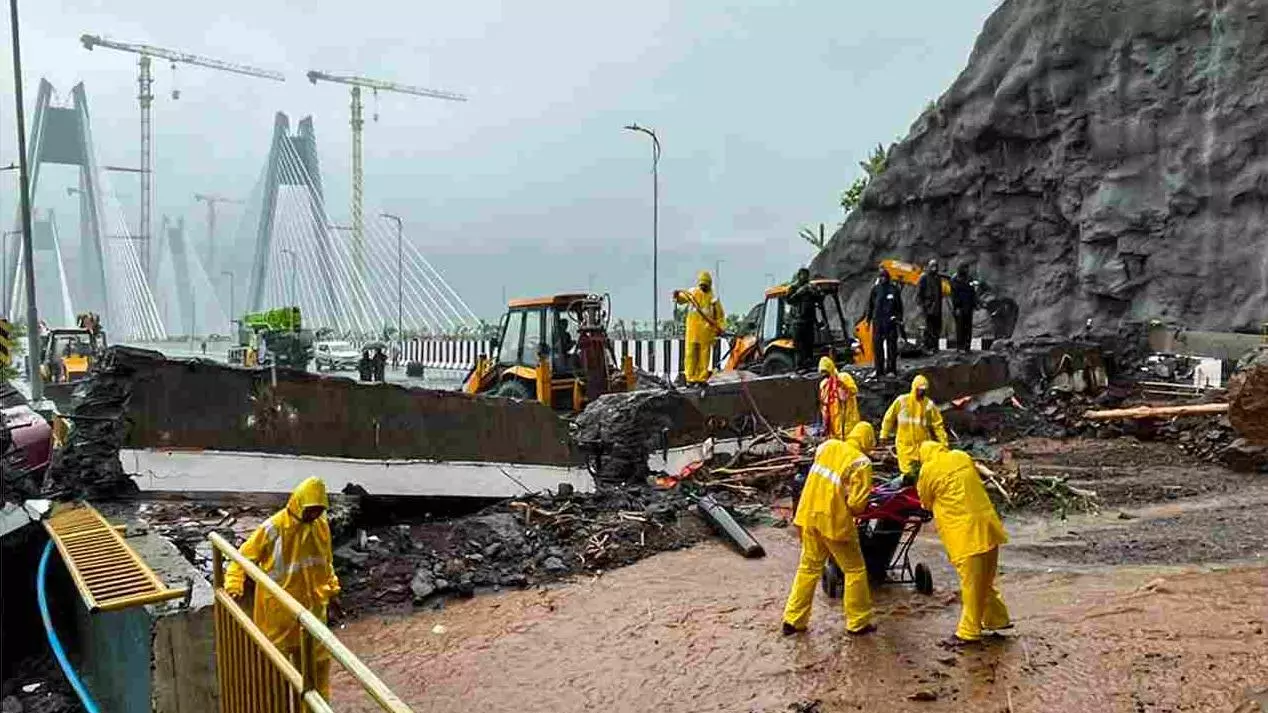 Mumbai on orange alert as heavy rain shuts schools, disrupts trains and floods roads